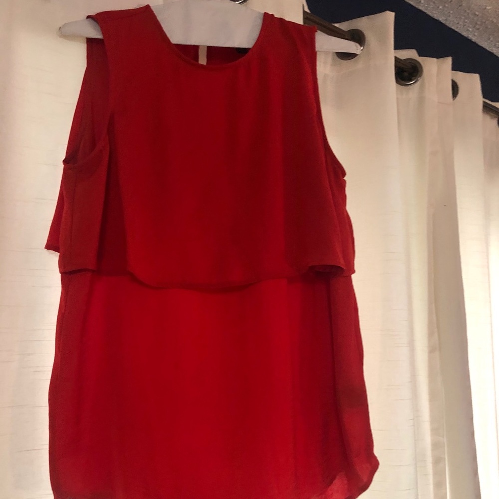 Red flowing top
